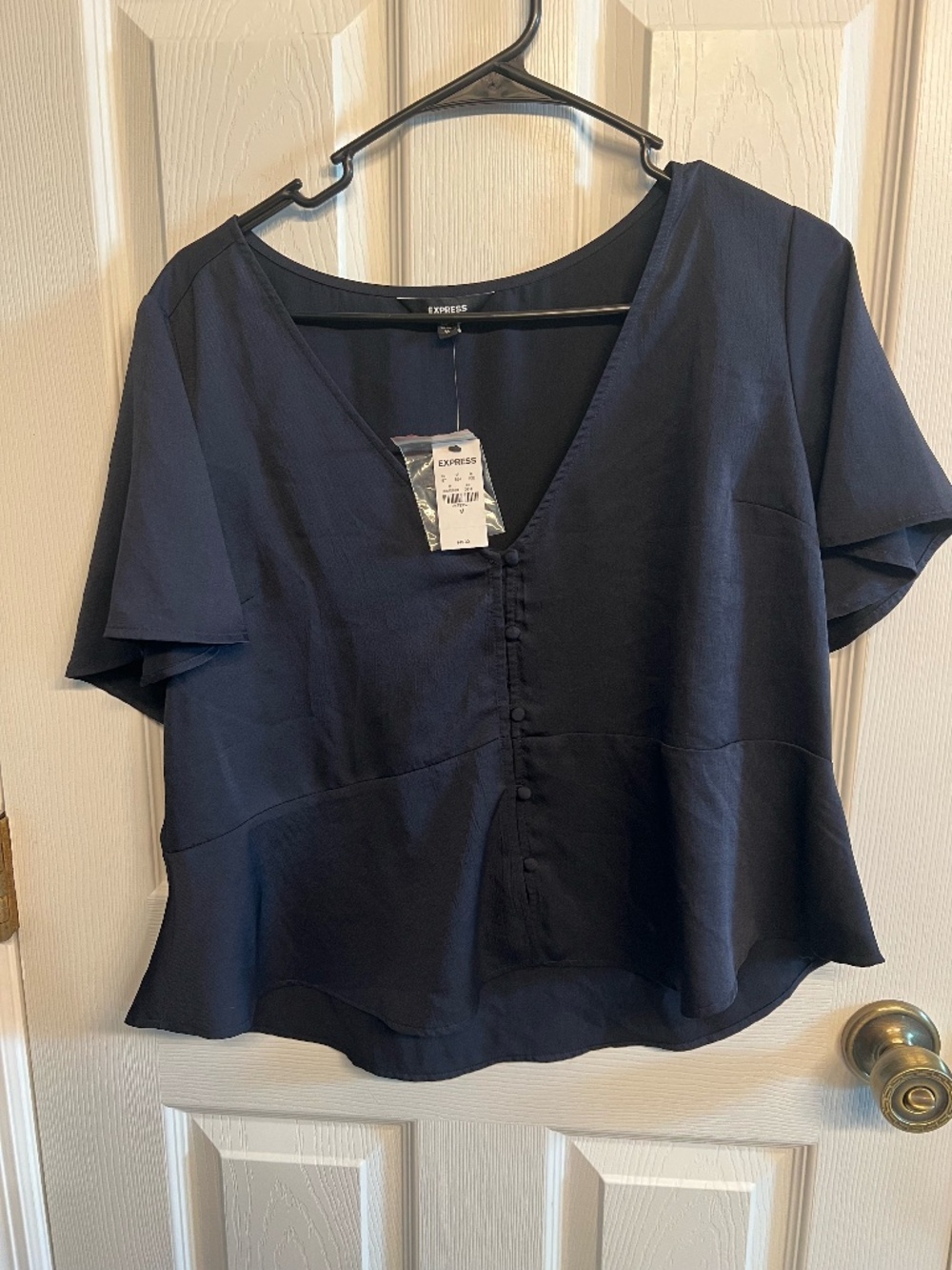 Express Black Solid V-Neck Short Sleeve Peplum Shirt